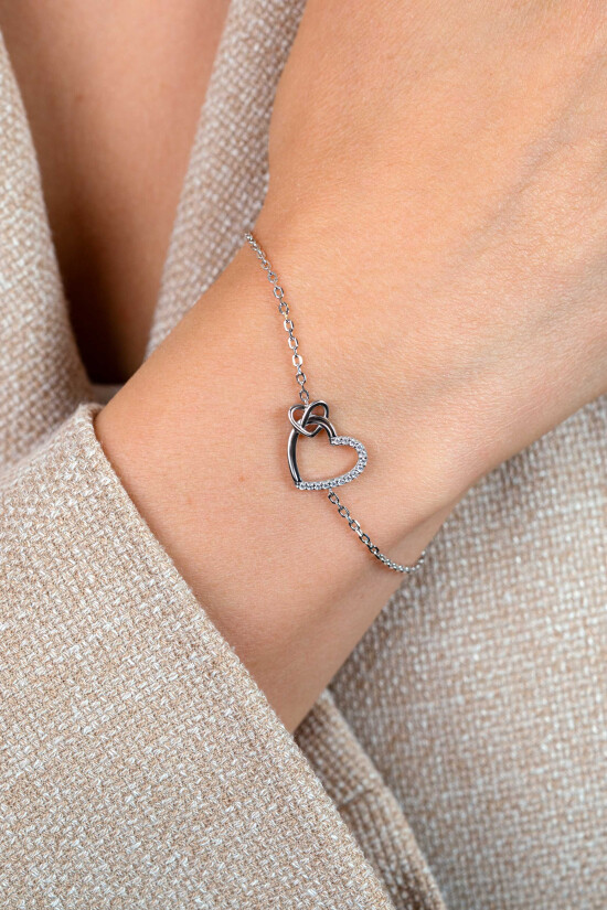 ZINZI zlv. armband twee harten verbonden zirc.