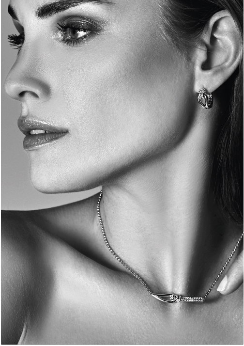 "Mart Visser by ZINZI Silberne Luxusohrringe 18x8mm geknotete Form, besetzt mit weißen Zirkonias MVO19"