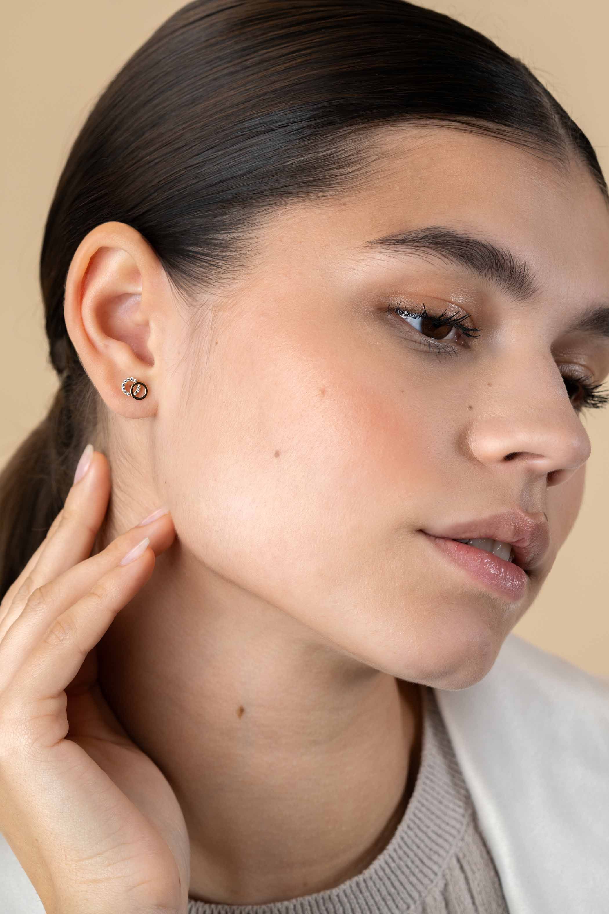 ZINZI GOLD oorknopjes 2 rond inelkaar 1 bezet zirc.