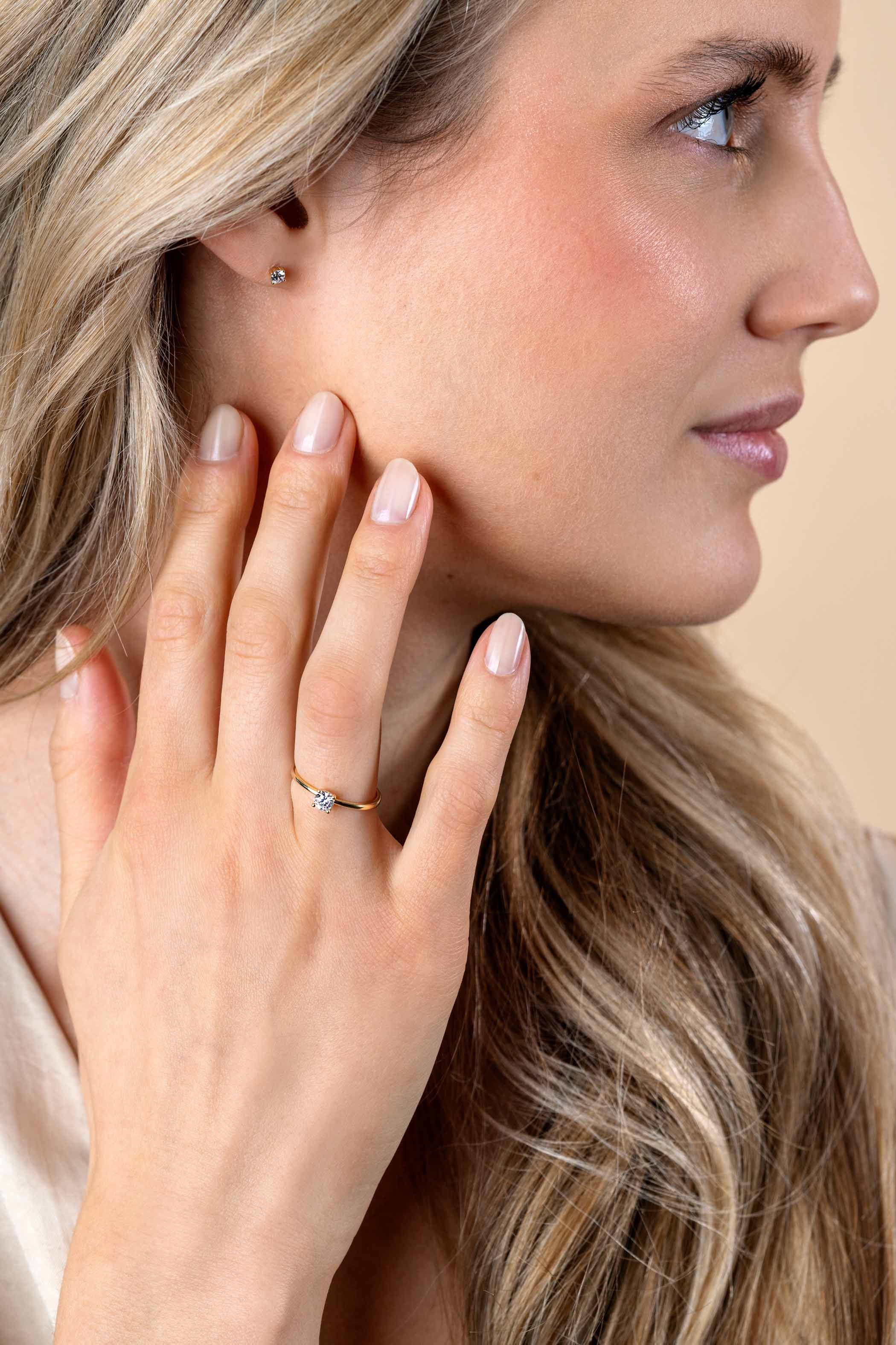 ZINZI Gold ring met zirc. in vierpoot chaton mt.58
