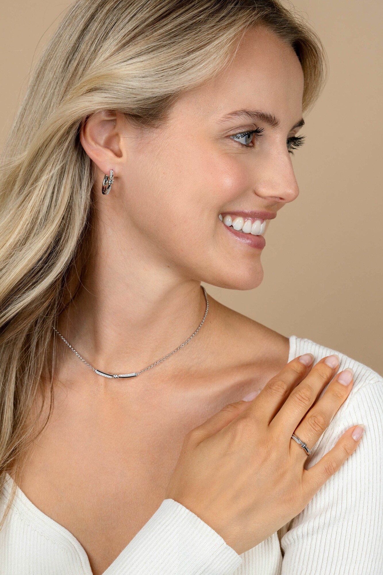 ZINZI Silberner Multi-Look-Ring (4mm breit) mit Knoten, besetzt mit weißen Zirkonias ZIR2680