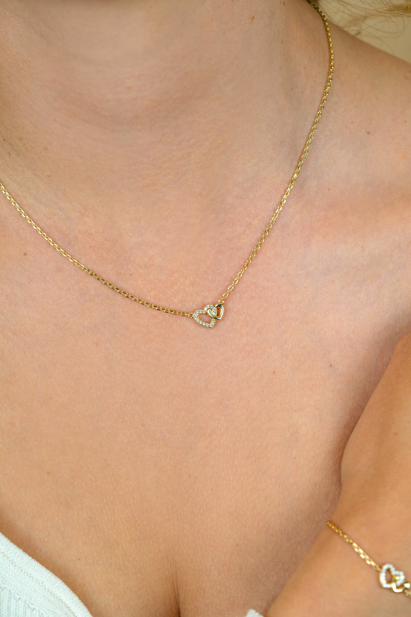 ZINZI zlv. collier gg.verg.2 hartjes verbonden 1x zirc.