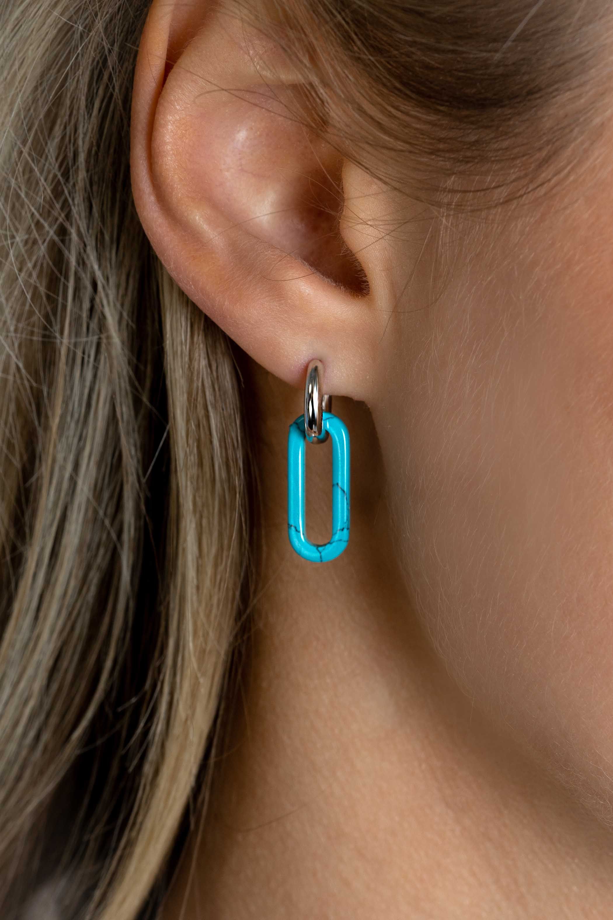 ZINZI zlv. oorbedels turquoise ovaal 20mm lang