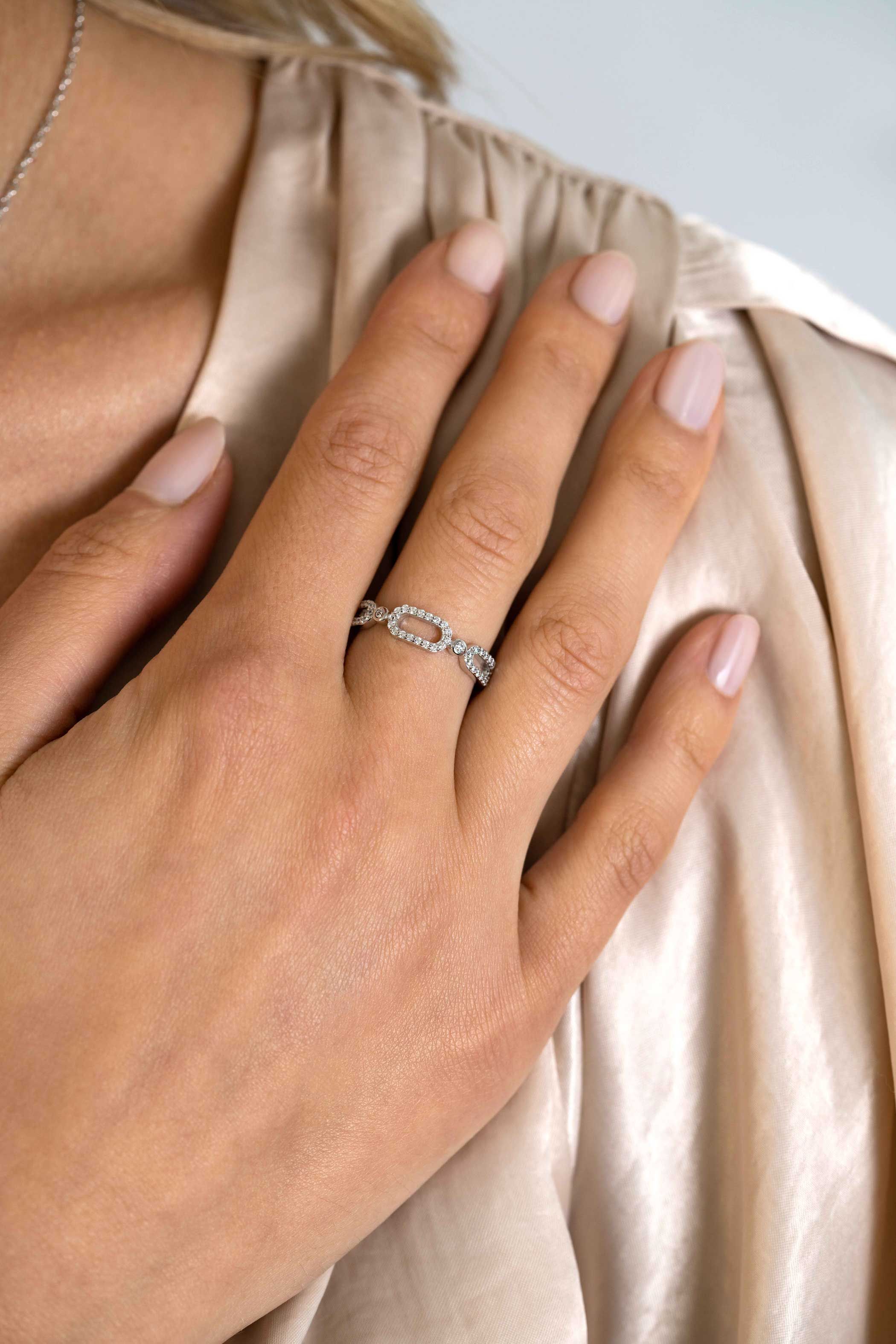 ZINZI zlv. ring 3x open schakel zirconia's mt.60