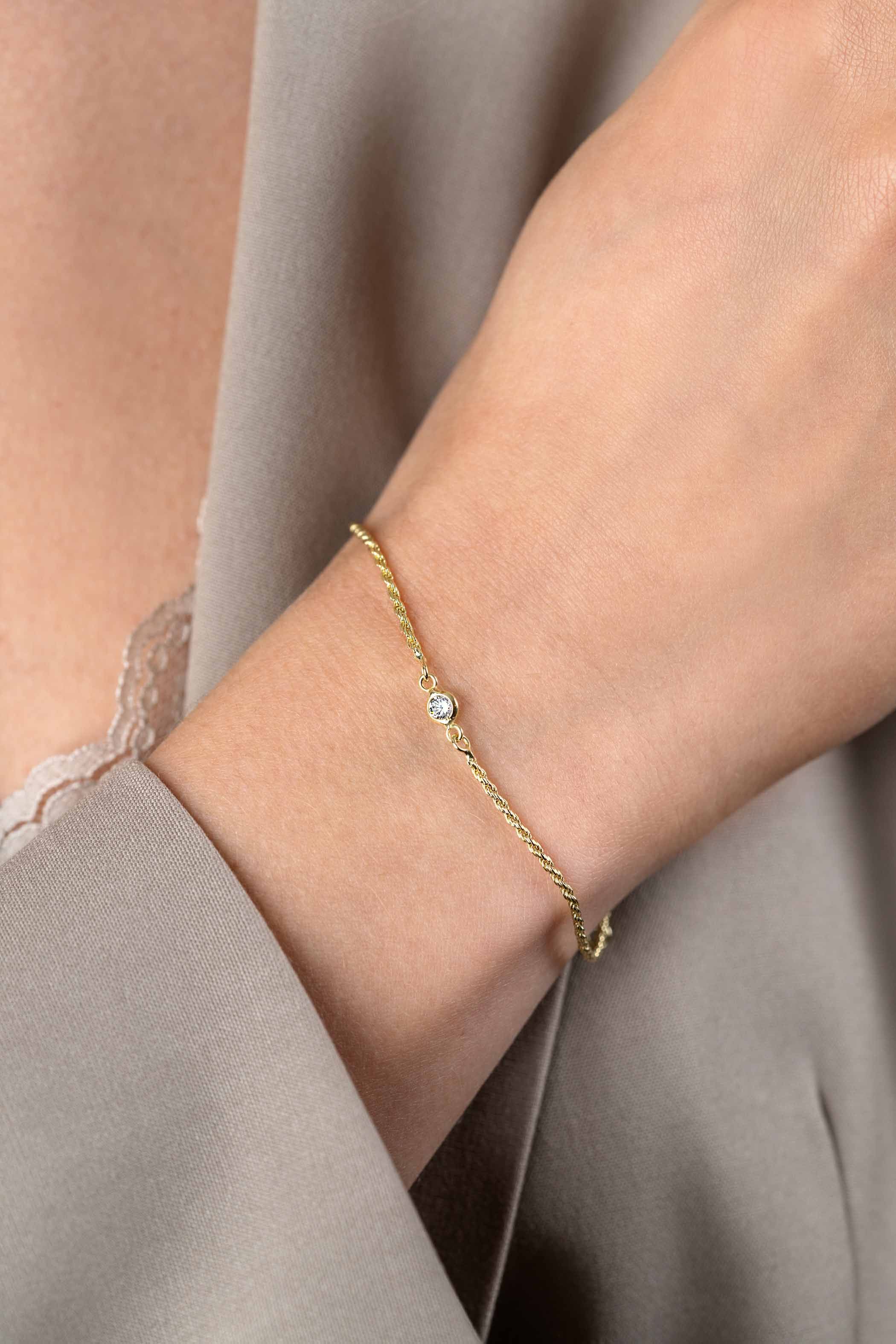 ZINZI zlv. armband gg.verg. koord met zirconia