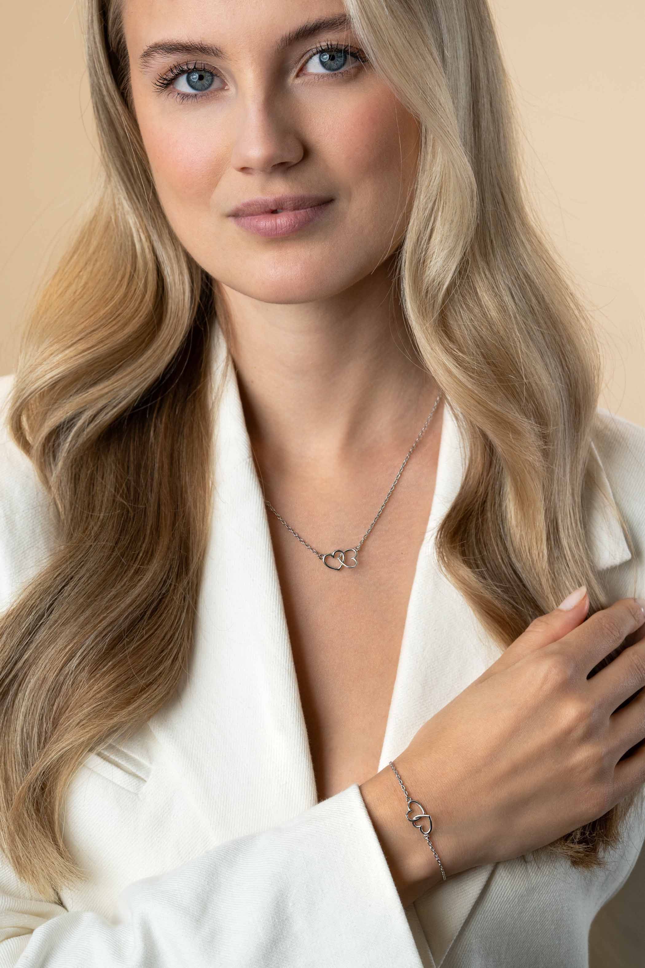 ZINZI zlv. collier twee hartjes in elkaar