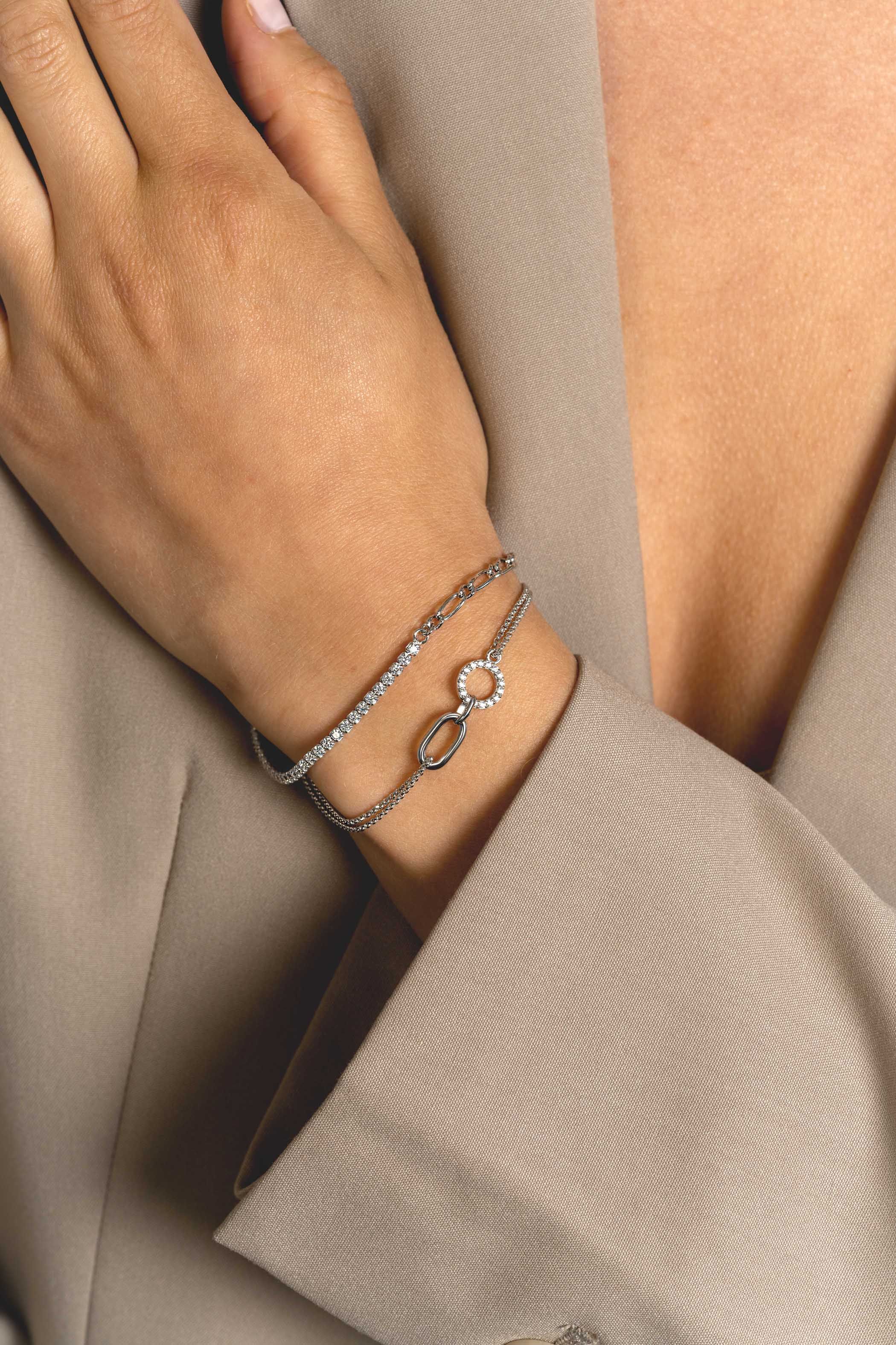 ZINZI zlv. armband half schakels half bezet zirconia's