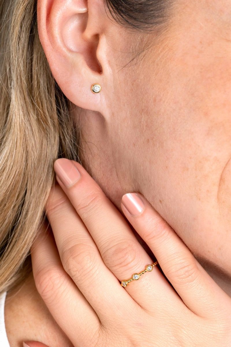 ZINZI Gold bolletjes ring met 3x ronde zirc. mt. 54