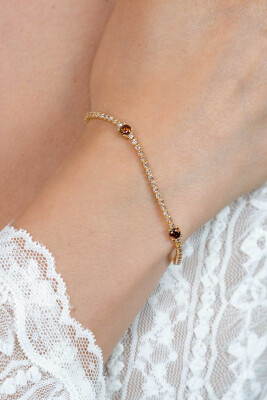 ZINZI zlv. tennisarmband gg.verg.fant.champ/bruin